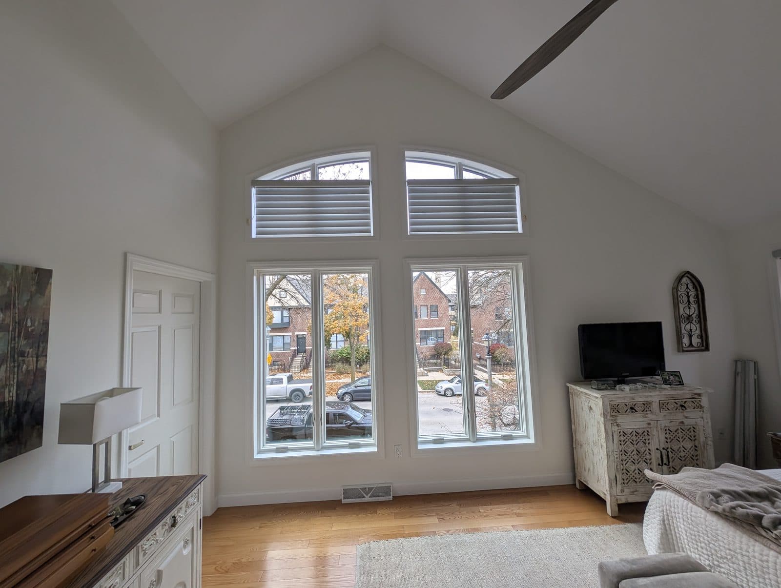 Tall casement windows with arched transoms in a vaulted great room in the Milwaukee area